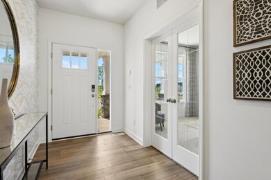(Photos of model home, features will vary) An open and airy foyer!