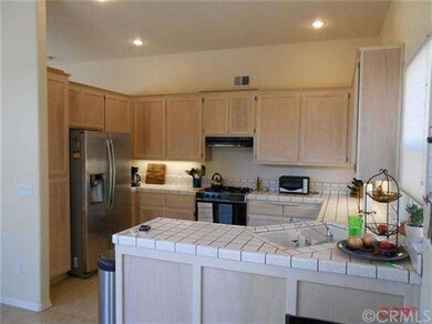 Open kitchen with plenty of counter space, cabinet