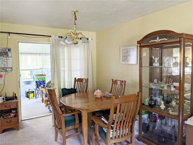 Open Floor Plan Dining Area with French Doors to t