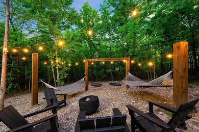 View of play area with a fire pit