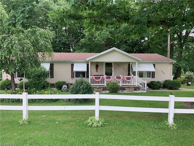 3245 Arrow Rd NW unit 17, Carrollton, OH 44615 - photo 2