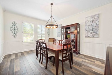 Well-lit with patterned flooring and white walls.