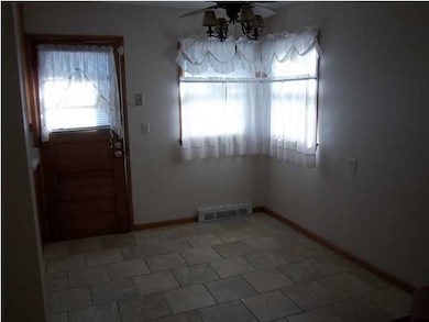Porcelain tile flooring in the dining room and kit