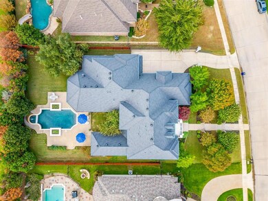 Aerial view of the entire property showcasing the lot size, landscaping, pool and spa.