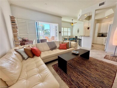 Living room with light tile patterned floors