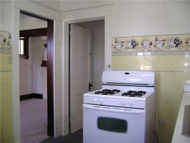 Kitchen. Kitchen to downstairs and to dining room.