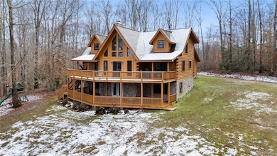 View of front of property with a lawn