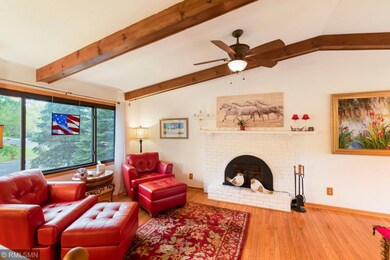 Cozy up to the wood burning fireplace on the main 