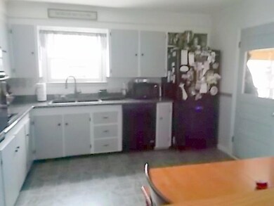 KITCHEN WITH GRANITE COUNTER TOPS