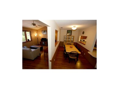 GREAT ROOM & DINING ROOM WITH GUEST HALF BATH ACRO