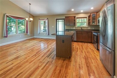 Open dining area looking out to the front porch