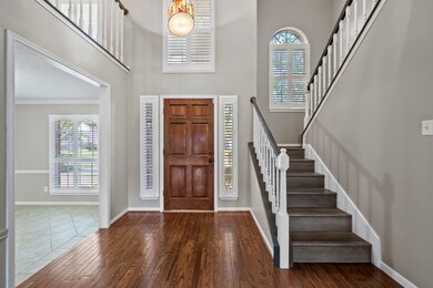 Exquisite Entryway with real hardwood floors.