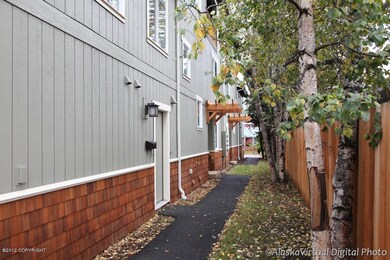 Walkway to garage man door & main entry.