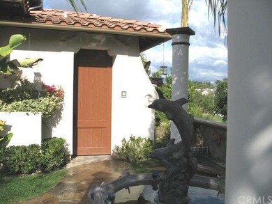 Entry to front Court Yard with two fountains, view