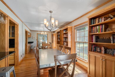 Dining Area with Built-In Bookcases