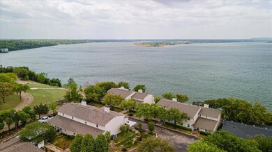Aerial view of the townhome with Lake Granbury in 