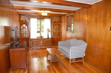 The other side of the Den has beautiful built in b