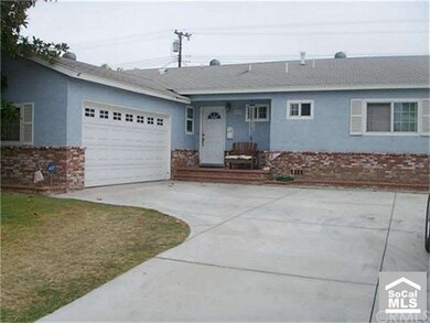 2 car garage has nook for washer & dryer and plenty of storage space & parking.