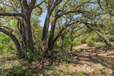 View of landscape featuring a forest view