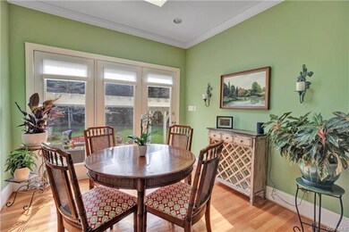 Breakfast/morning room features skylight and new g