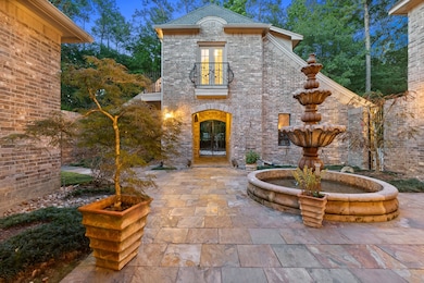 Imagine coming home from a long day at work, enjoying your favorite beverage at a patio table, listening to the wildlife, the water fountain, the crackling of the wood as you watch the flames kindle in the fireplace.