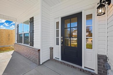 The Country Porch will be perfect for your table, chairs and other decorations you may want to display! Spacious Foyer with natural lighting as you enter the house.