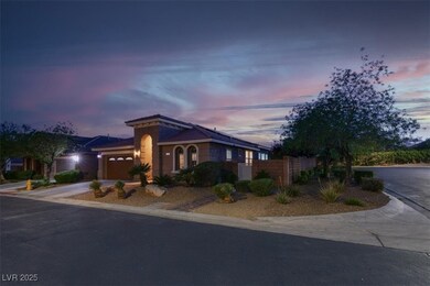 View of front of property featuring fence, an atta