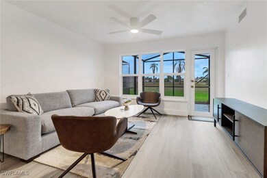 Living room with ceiling fan, baseboards, visible