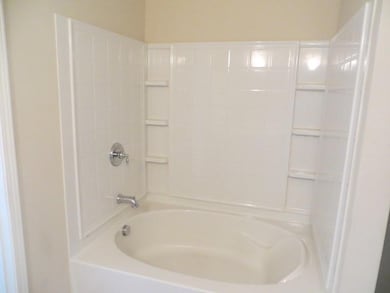 Bathroom with shower / bathtub combination