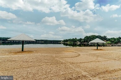 Community sandy beach and lake
