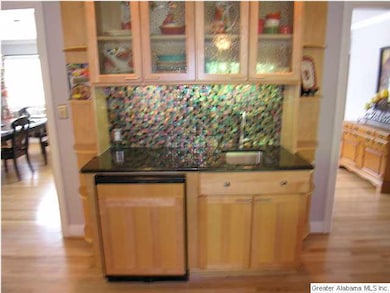 Wet bar with sink and refrigerator