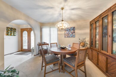 Formal dining room located just off the foyer is p