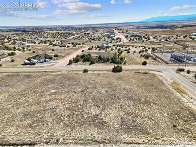 Birds eye view of property featuring a mountain vi