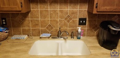 5633 SW Foxcroft Cir S unit 204, Topeka, KS 66614 - photo 5