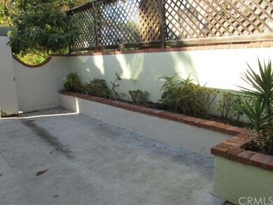   Back Patio Area with Gate to Garage