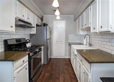 Kitchen with decorative backsplash, under cabinet