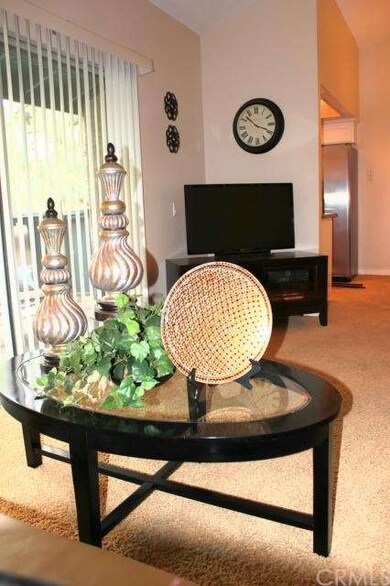 View of living area that opens to patio doors. Cab