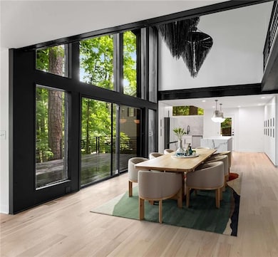 The sun drenched open concept main level is ideal 