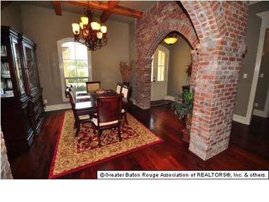 Notice the 2 brick arch ways & cypress beams in di