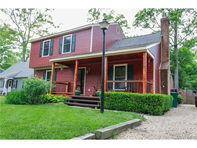 Beautiful landscaping leads to a relaxing front po