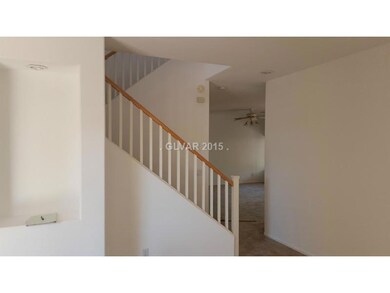 Living Room. View of stairs from living room