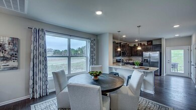 Dining room.  Photo of decorated model home.