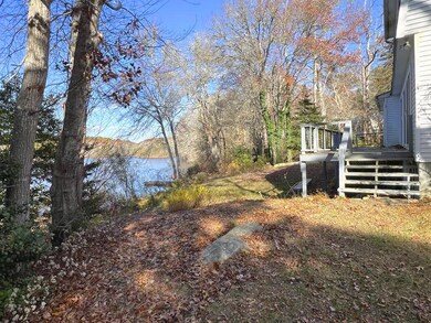 view of deck and pond