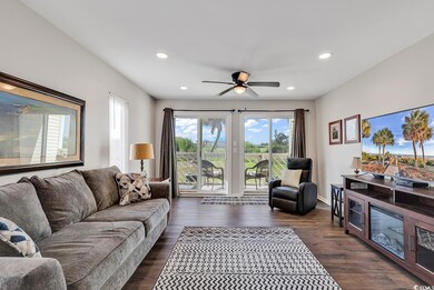 Living room featuring dark wood-type flooring and 