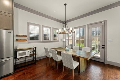 Large dining area with many windows in two differe