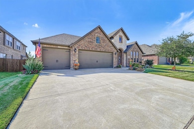 Fantastic 3 car garage has space for a workshop or your extra equipment.