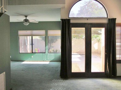 DOORS FROM THE LIVING ROOM TO THE PATIO