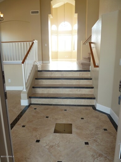 Foye entry w/travertine designs