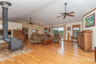 Vaulted living and dining room area.