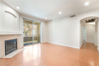 Unfurnished living room with recessed lighting, li